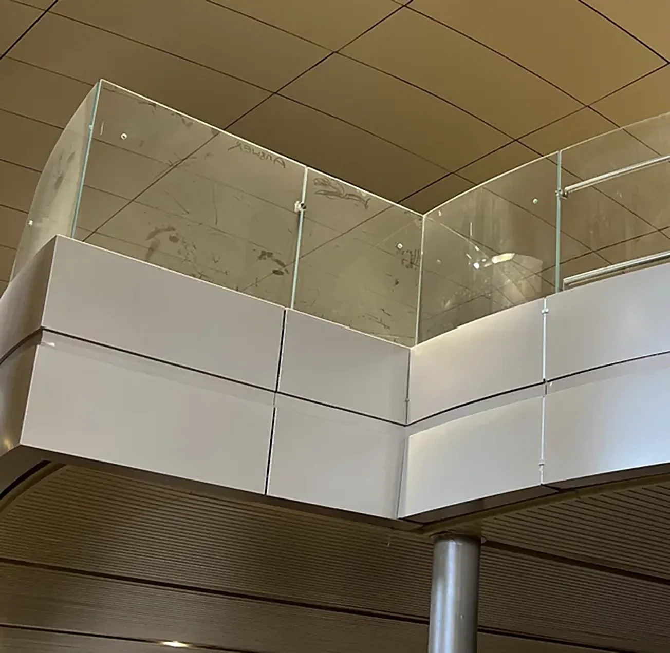 Metal facade corner with glass balustrade