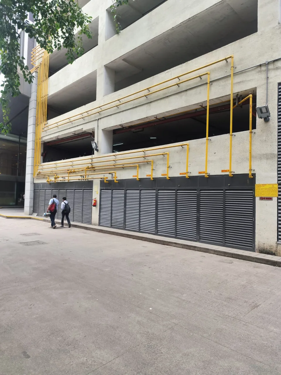 Louvered screen on a car-park frontage at Lodha OLP